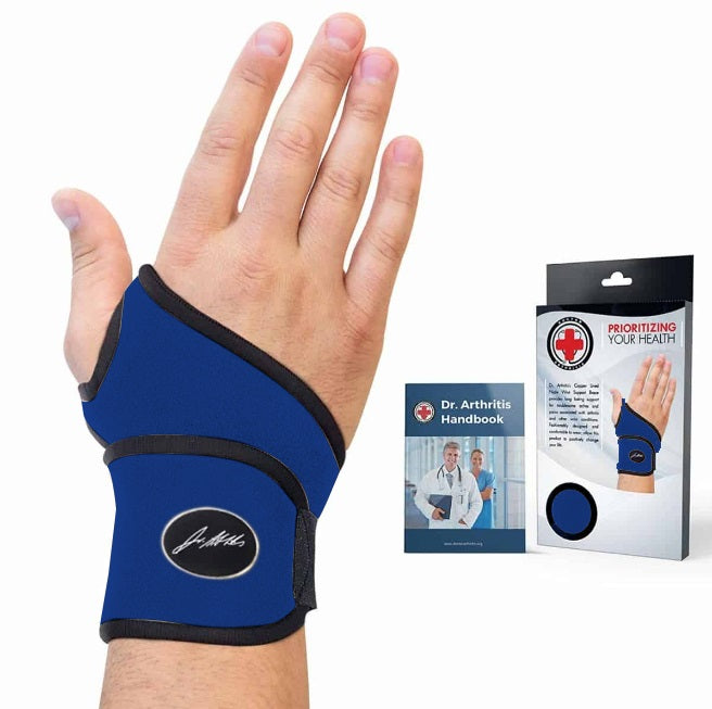 A Copper Lined Wrist Support brace from Dr. Arthritis on a human hand with an informational handbook on wrist health.