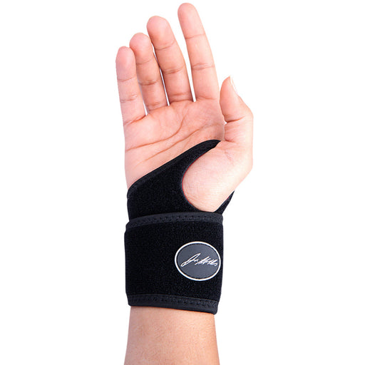 A woman's hand with a Copper Lined Bowling Wrist Brace [Single] for arthritis support from Dr. Arthritis.