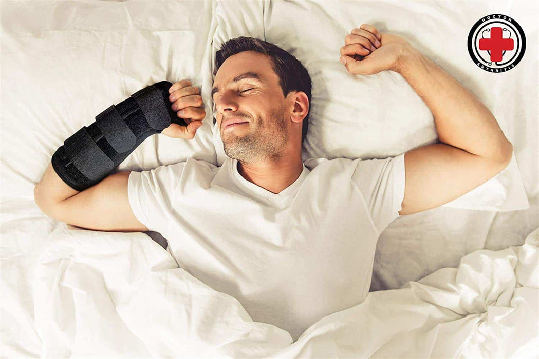 A man wearing a Dr. Arthritis Carpal Tunnel Bundle for carpal tunnel syndrome is smiling while stretching in bed, with a medical logo in the top right corner.