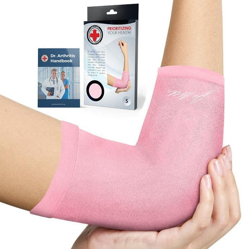 A woman holding a pink Copper Infused Elbow Compression Sleeve by Dr. Arthritis.